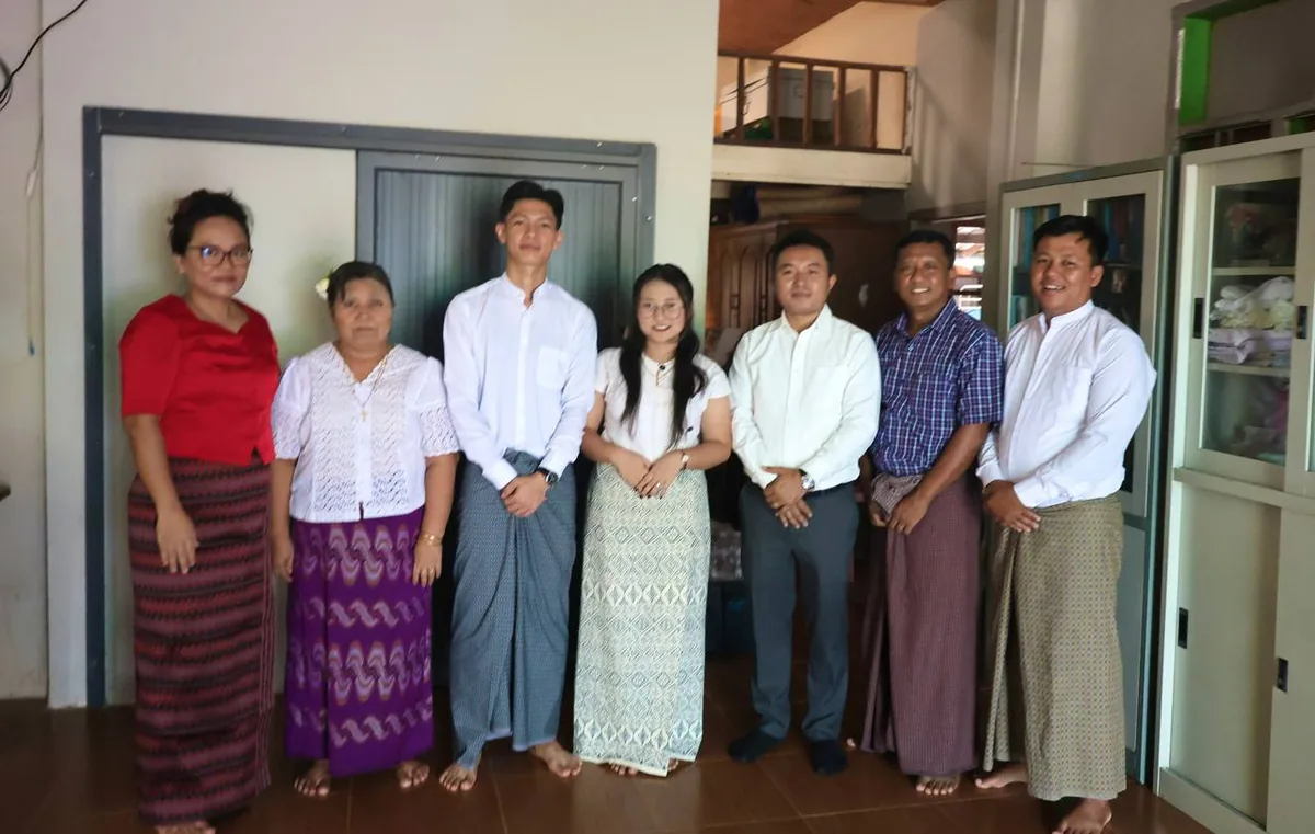 Htet and Gloria with their families